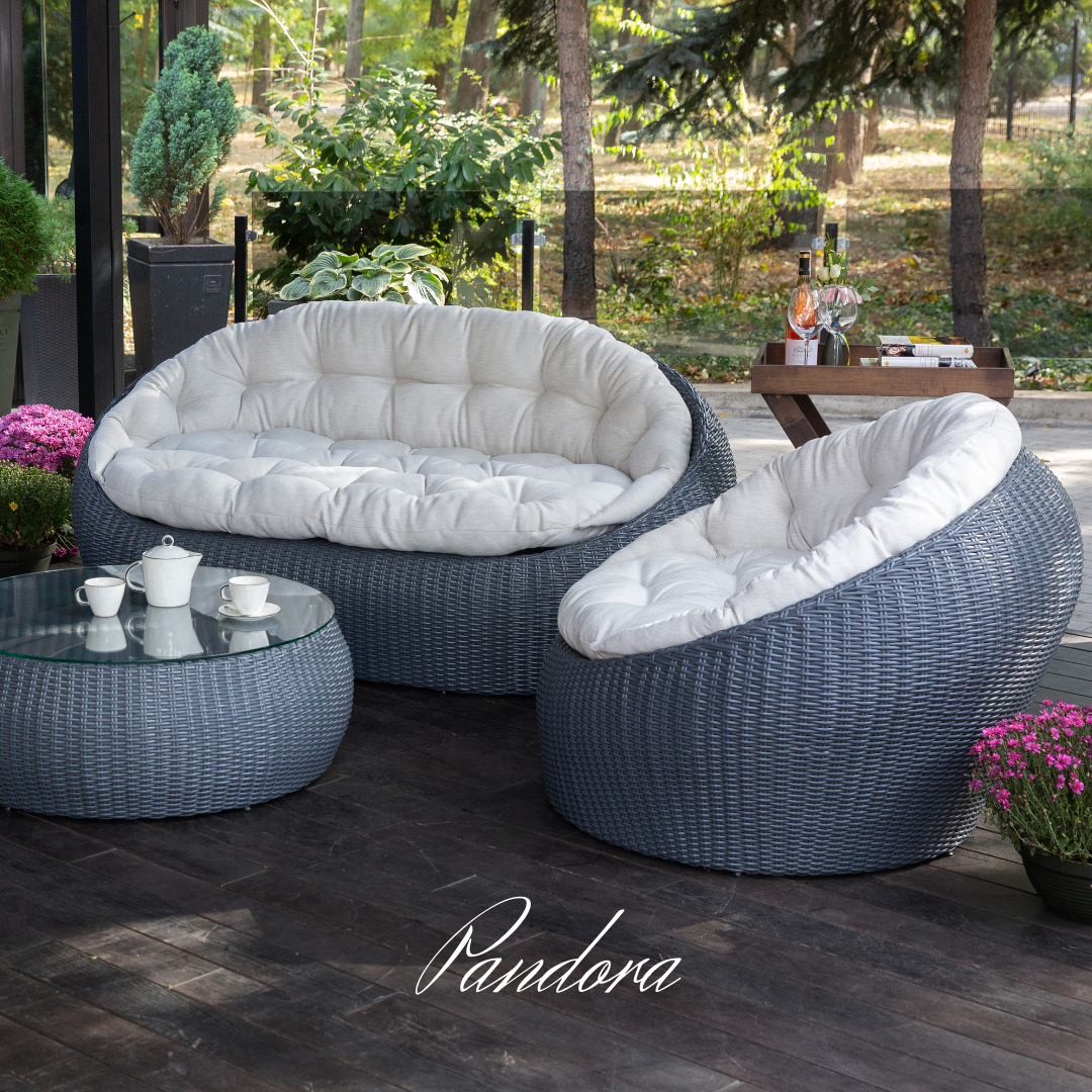 Outdoor Wicker Lounge Set. Includes 2 armchairs, sofa and coffee table