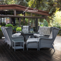 LONDON FAMILY. 8 Person Outdoor Dining & Lounge Set In Graphite Wicker. Includes 2 sofas, 2 armchairs, large table, coffee table and pouf