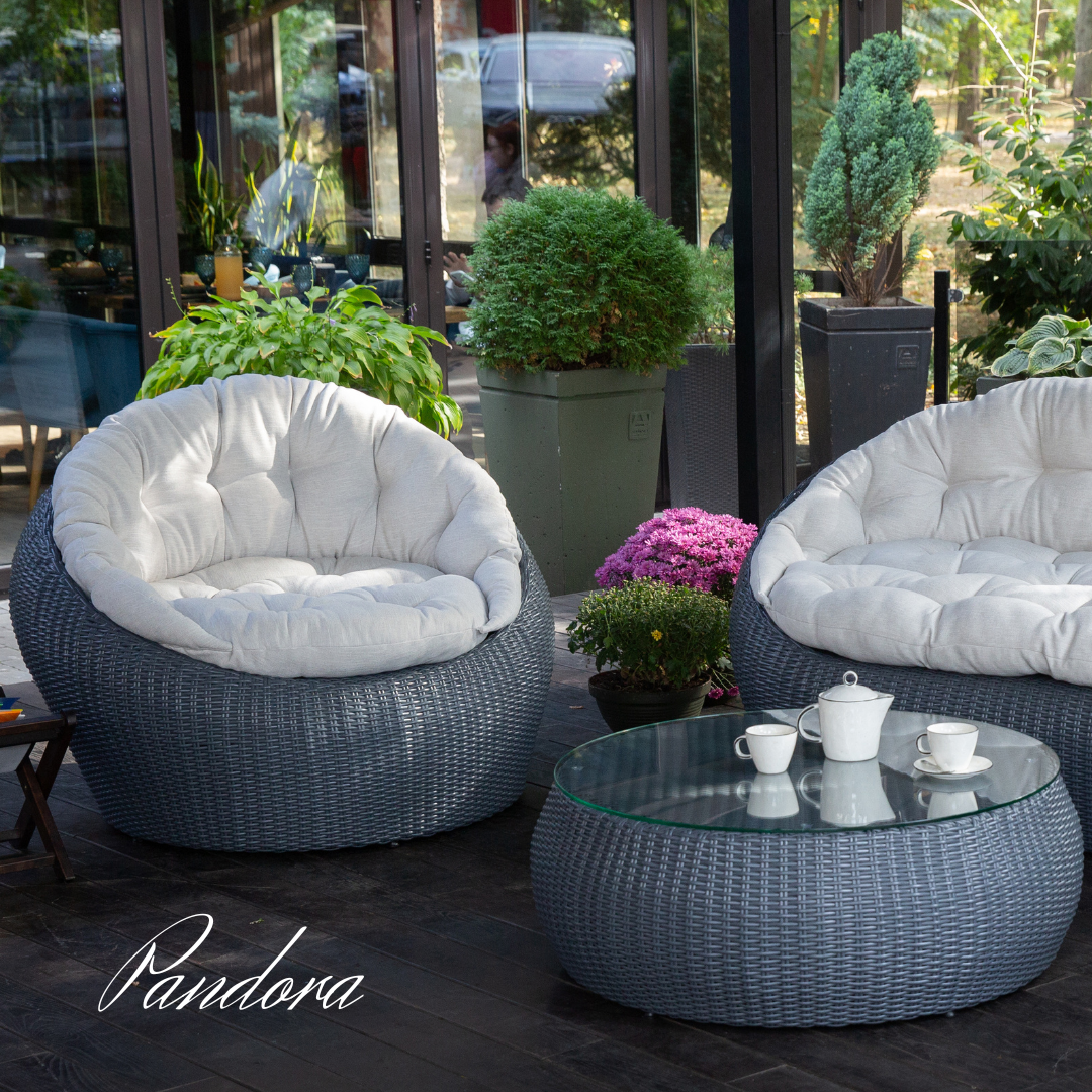 Outdoor Wicker Lounge Set. Includes 2 armchairs, sofa and coffee table