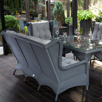 LONDON FAMILY. 8 Person Outdoor Dining & Lounge Set In Graphite Wicker. Includes 2 sofas, 2 armchairs, large table, coffee table and pouf