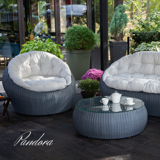 Outdoor Wicker Lounge Set. Includes 2 armchairs, sofa and coffee table