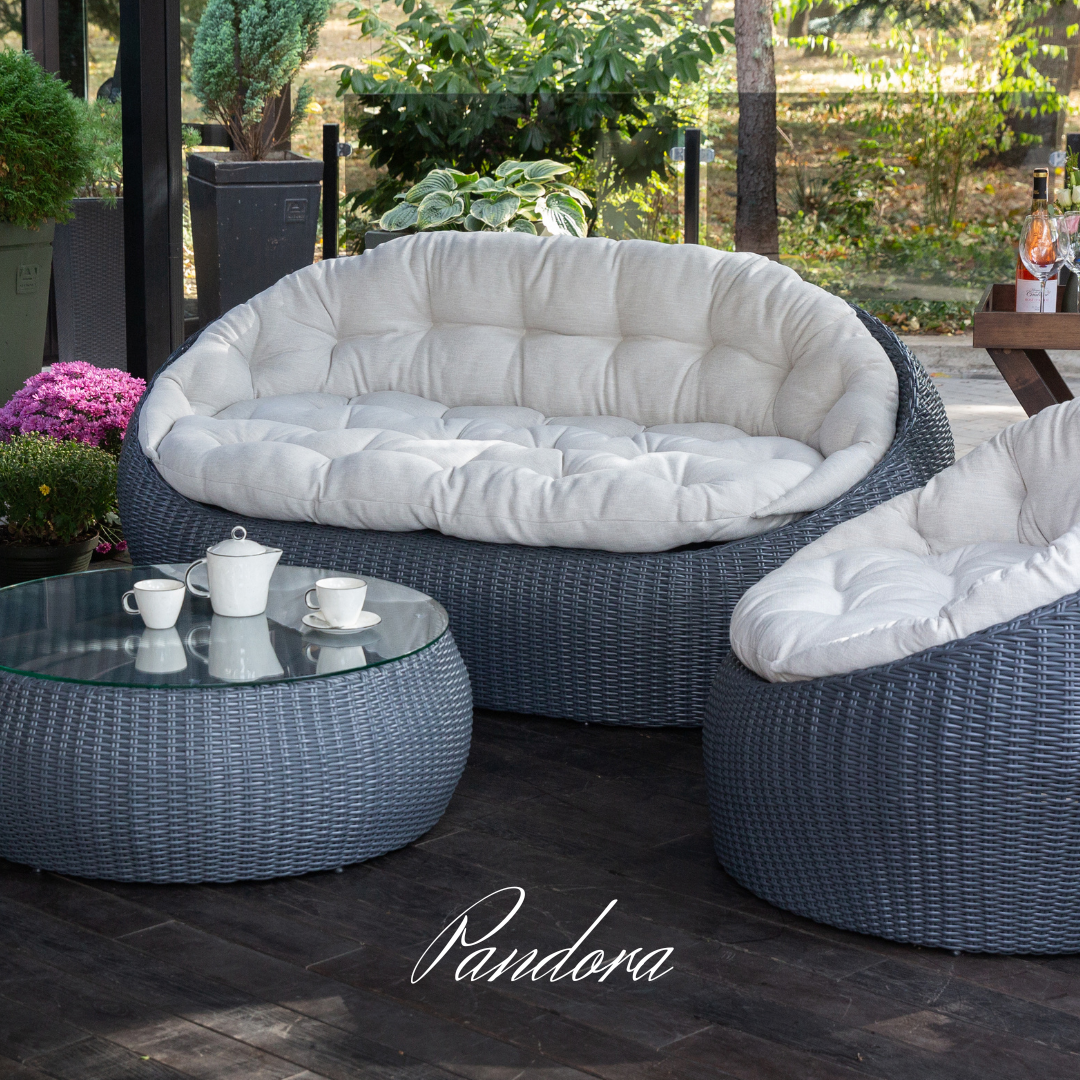 Outdoor Wicker Lounge Set. Includes 2 armchairs, sofa and coffee table