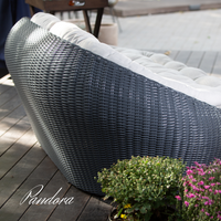 Outdoor Wicker Lounge Set. Includes 2 armchairs, sofa and coffee table