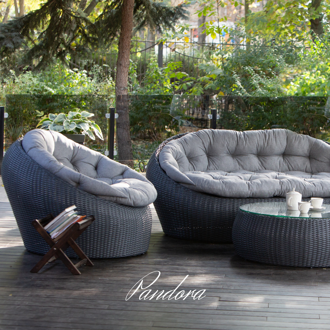 Outdoor Wicker Lounge Set. Includes 2 armchairs, sofa and coffee table