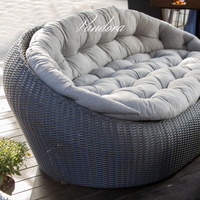 Outdoor Wicker Lounge Set. Includes 2 armchairs, sofa and coffee table