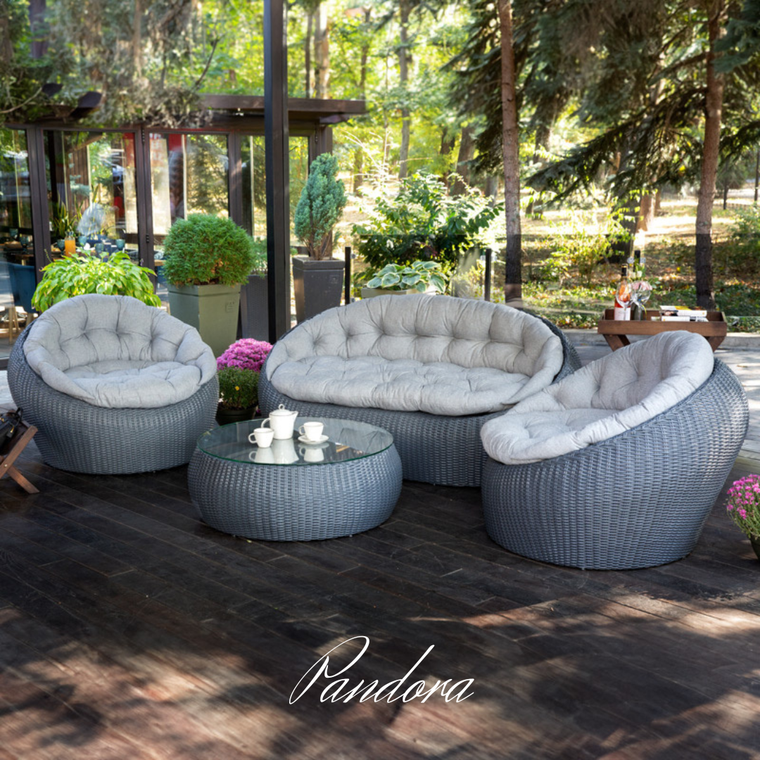 Outdoor Wicker Lounge Set. Includes 2 armchairs, sofa and coffee table